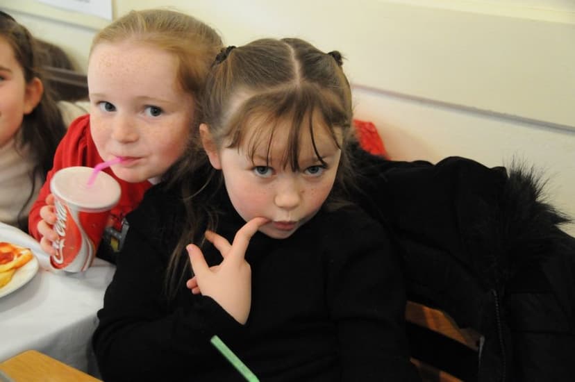 Girls at Christmas Mass