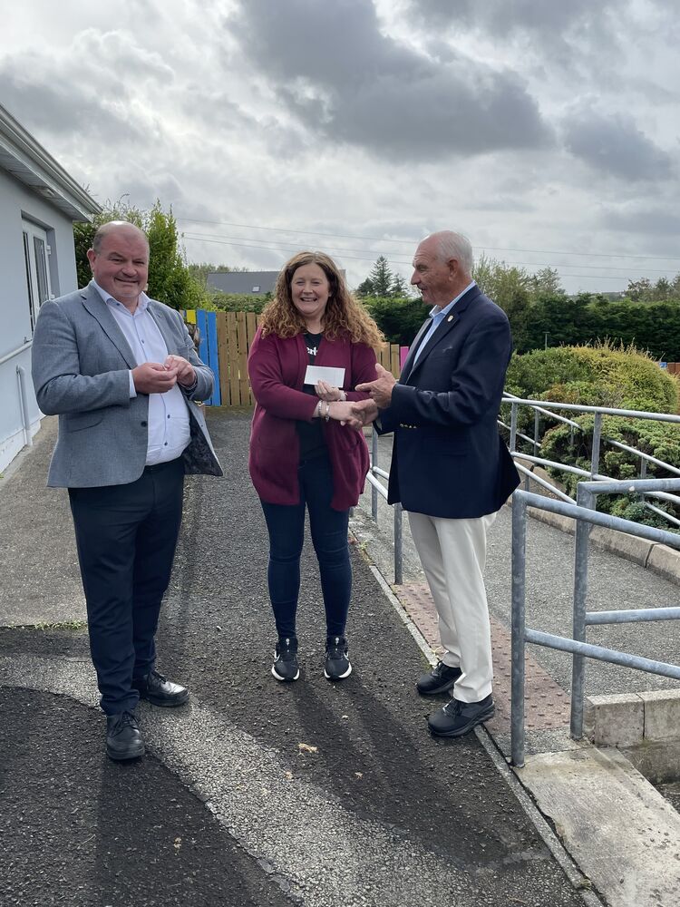 Billy Higgins presenting a $5,000 check at Ballaghderg Pre-School in Letterkenny